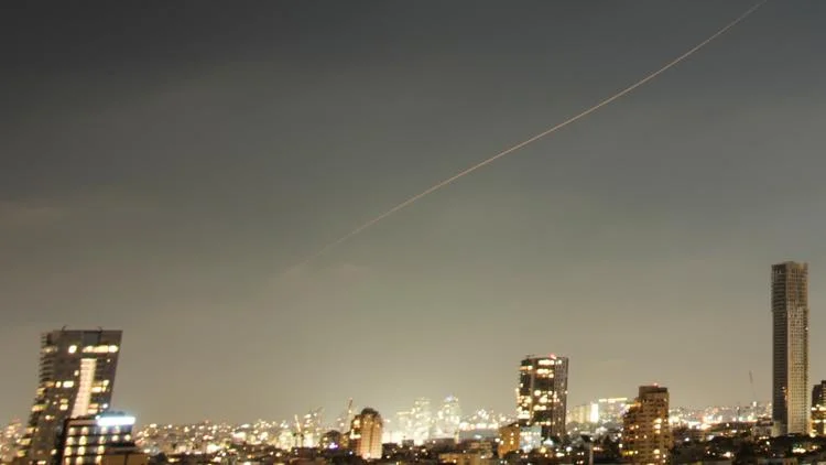 US launches a second day of strikes in Iranian cities;...