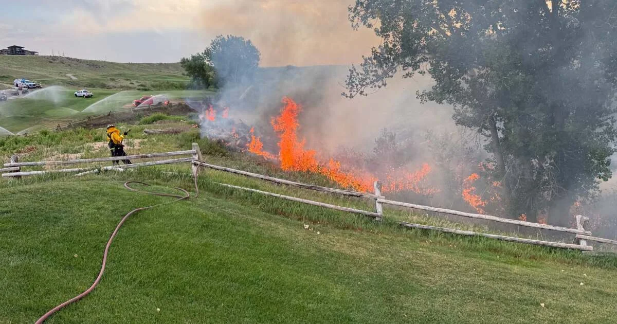 Lightning strike sparks dry grass fire at Fox Hollow...