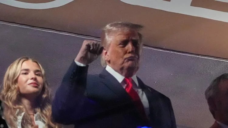 Donald Trump booed by the crowd during the anthem prior...